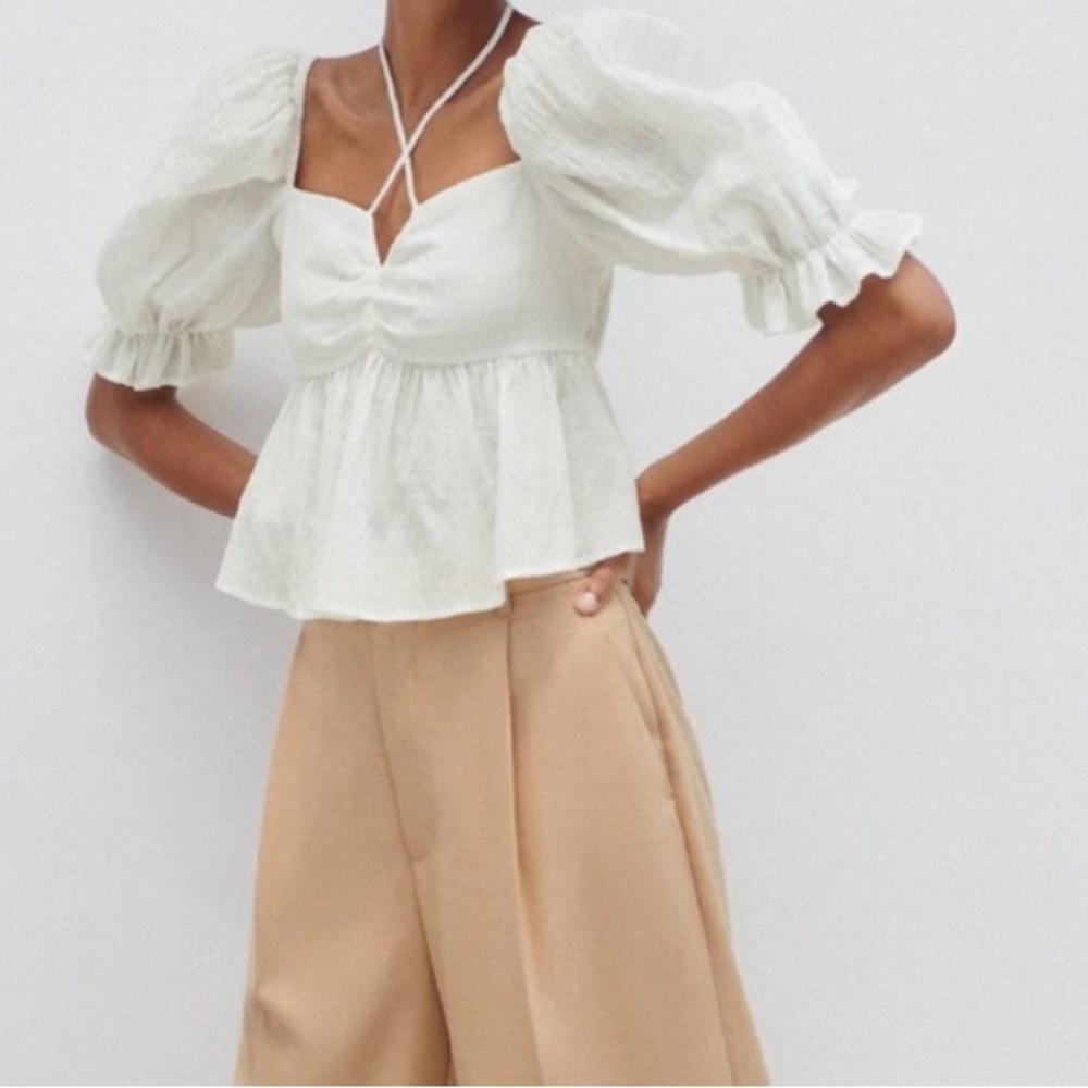 Zara peplum top in oyster white. New without tag. Size medium